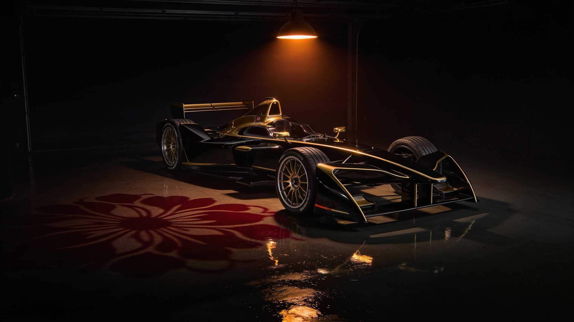 A black and gold race car in a dark garage